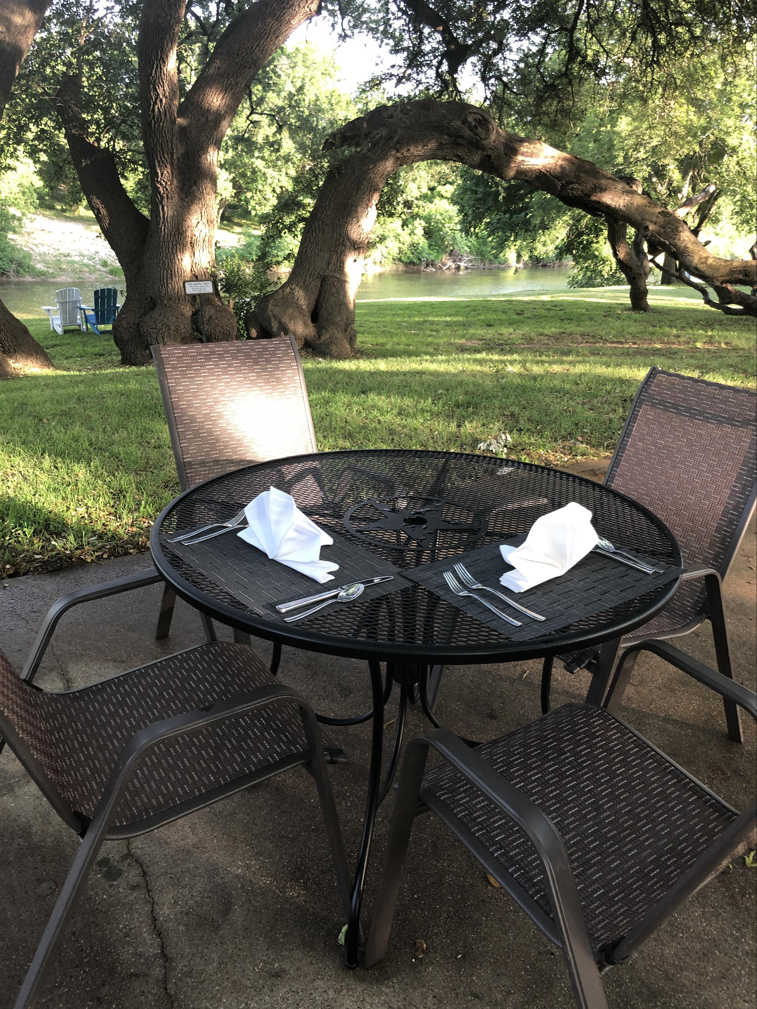 Outdoor Dining near Singing Trees at Inn on the River